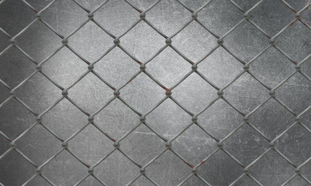 3D wire mesh on grunge metal background 3D render of a wire mesh on grunge metal background