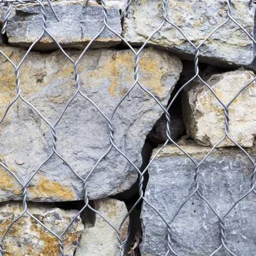 rocks-stone-with-metal-fence